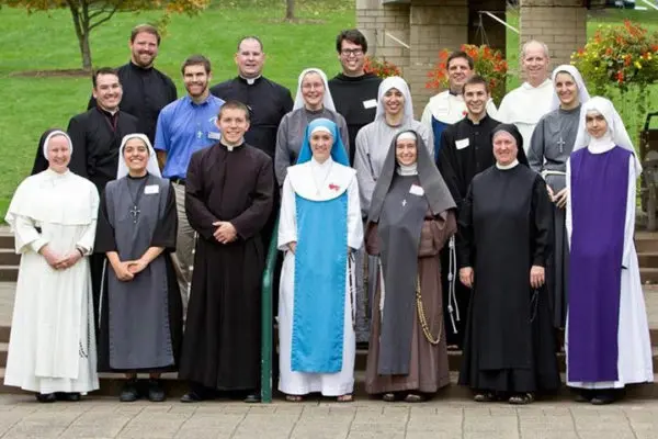group of priests and nuns