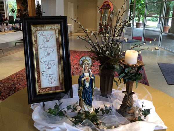reception tabletop with virgin mary.